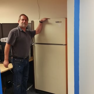 Kevin Jorgensen shows off the new IMR team fridge. 2016-04-20_08.42.57.jpg